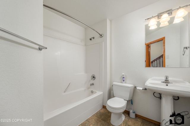 118 S Vickie Cir, Palmer, AK 99645 - full bathroom with toilet, shower / bathtub combination, and baseboards