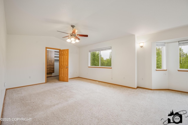 118 S Vickie Cir, Palmer, AK 99645 - empty room with carpet floors, ceiling fan, vaulted ceiling, and baseboards
