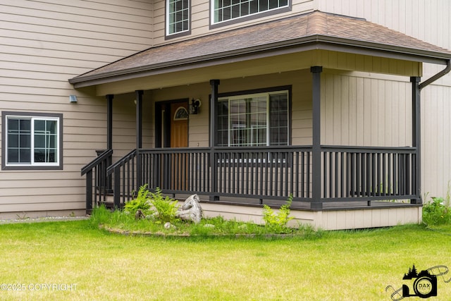 118 S Vickie Cir, Palmer, AK 99645 - entrance to property with a lawn, a porch, and a shingled roof