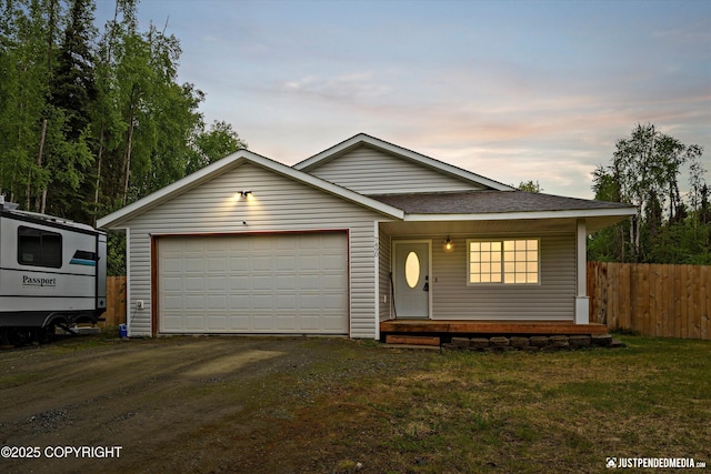 7490 W Rodney Cir, Wasilla, AK 99623 - view of front of home with driveway, an attached garage, and a shingled roof