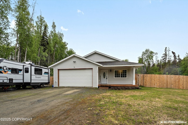 7490 W Rodney Cir, Wasilla, AK 99623 - view of front of home with an attached garage, a porch, and dirt driveway