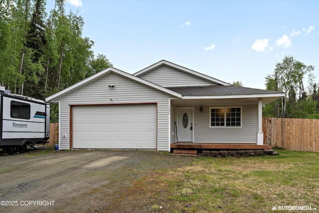 7490 W Rodney Cir, Wasilla, AK 99623 - view of front of property with covered porch, an attached garage, driveway, and a shingled roof
