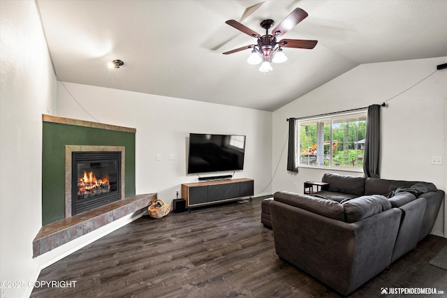 7490 W Rodney Cir, Wasilla, AK 99623 - living area with a ceiling fan, dark wood-style floors, lofted ceiling, and a fireplace