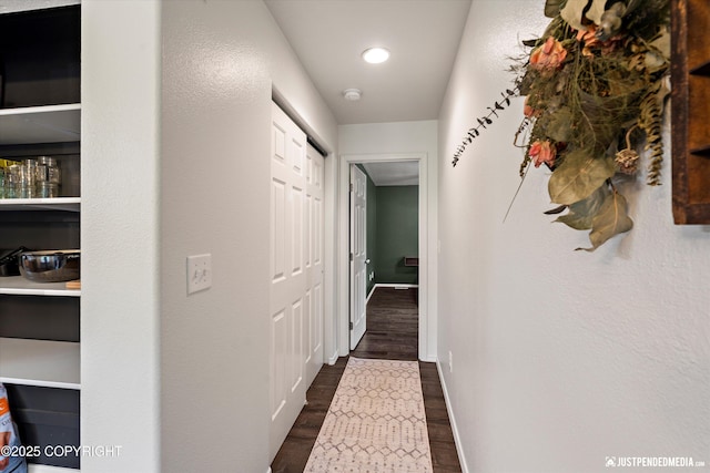 7490 W Rodney Cir, Wasilla, AK 99623 - corridor with dark wood finished floors, baseboards, and recessed lighting