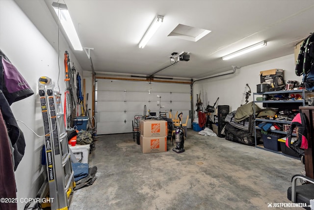 7490 W Rodney Cir, Wasilla, AK 99623 - garage featuring a garage door opener
