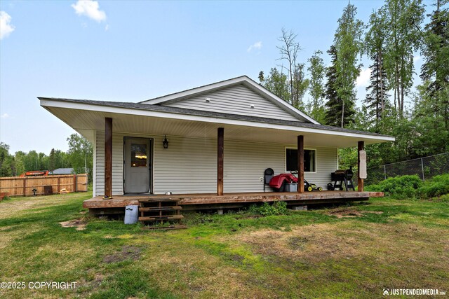 7490 W Rodney Cir, Wasilla, AK 99623 - rear view of house with covered porch