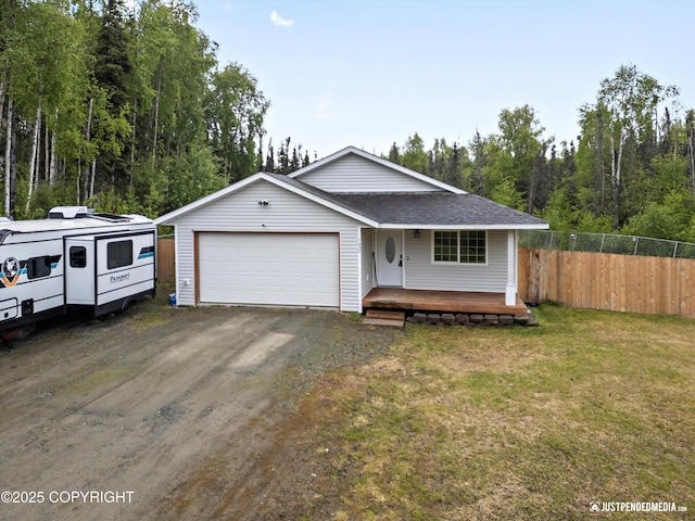 7490 W Rodney Cir, Wasilla, AK 99623 - view of front facade featuring a garage, driveway, covered porch, and roof with shingles