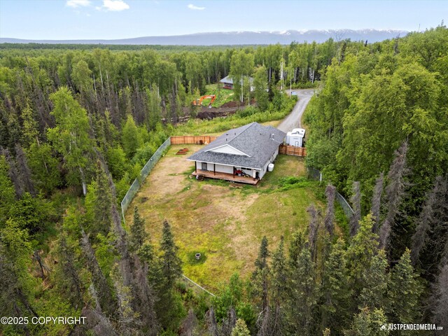 7490 W Rodney Cir, Wasilla, AK 99623 - view of subject property featuring a heavily wooded area