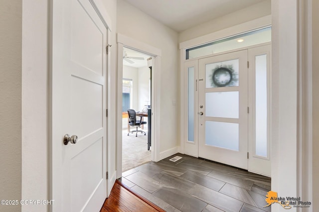 5466 Sandhill Loop, Anchorage, AK 99502 - foyer entrance with dark wood-type flooring and ceiling fan