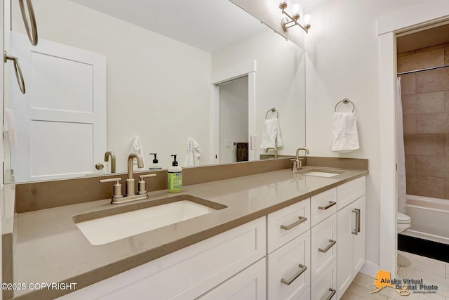 5466 Sandhill Loop, Anchorage, AK 99502 - bathroom with double vanity, toilet, tile patterned flooring, and shower / tub combo with curtain