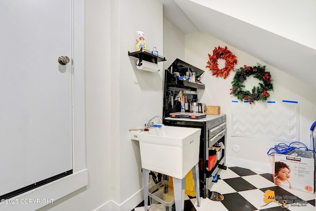 5466 Sandhill Loop, Anchorage, AK 99502 - laundry room with tile patterned floors