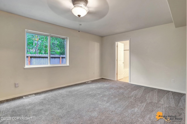 2598 Brookshire Loop # 27, Anchorage, AK 99504 - unfurnished room featuring ceiling fan and carpet floors