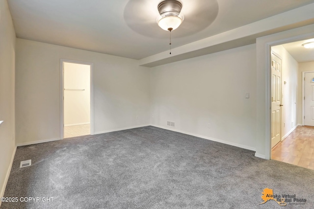 2598 Brookshire Loop # 27, Anchorage, AK 99504 - carpeted spare room with a ceiling fan and baseboards