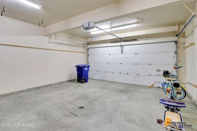 2598 Brookshire Loop # 27, Anchorage, AK 99504 - garage featuring a garage door opener