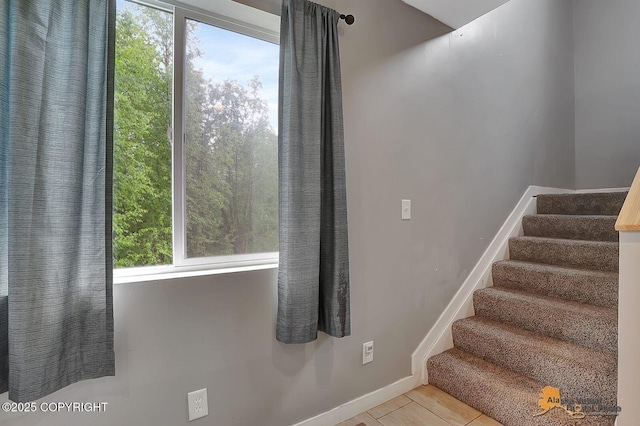 8825 W Mcquire Ln, Wasilla, AK 99623 - stairway featuring plenty of natural light