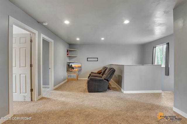 8825 W Mcquire Ln, Wasilla, AK 99623 - living area featuring recessed lighting, an upstairs landing, and carpet flooring
