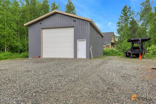 8825 W Mcquire Ln, Wasilla, AK 99623 - detached garage featuring driveway