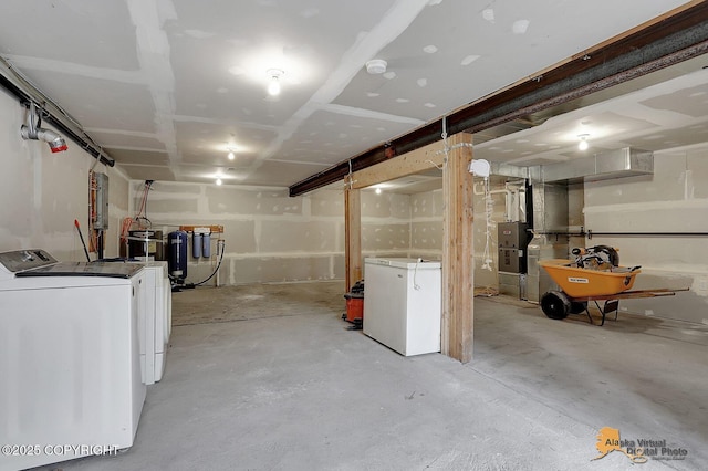8825 W Mcquire Ln, Wasilla, AK 99623 - unfinished below grade area featuring washer and clothes dryer and refrigerator
