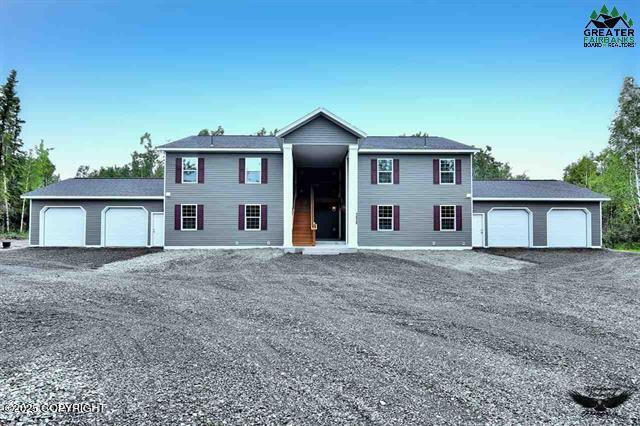 310 Park Way N, Pole, AK 99705 - view of front of home featuring a garage