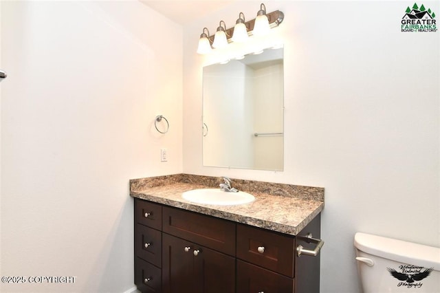 310 Park Way N, Pole, AK 99705 - bathroom featuring vanity and toilet