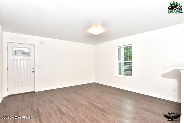 310 Park Way N, Pole, AK 99705 - unfurnished room with dark wood finished floors and baseboards