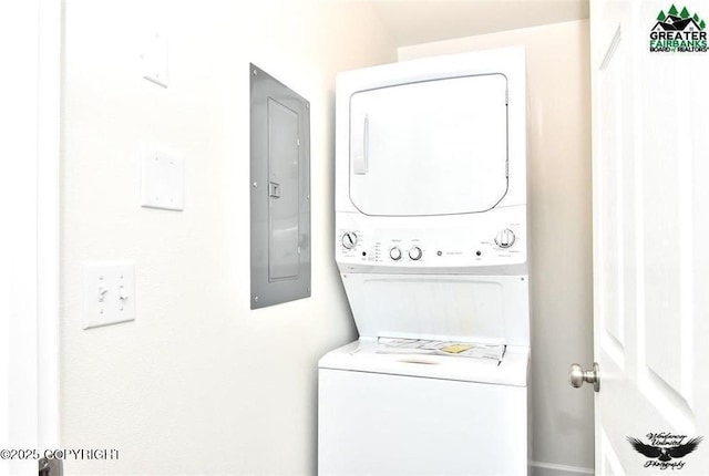 310 Park Way N, Pole, AK 99705 - laundry room with electric panel and stacked washer / dryer