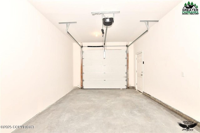 310 Park Way N, Pole, AK 99705 - garage featuring a garage door opener