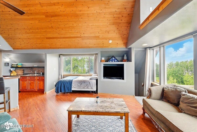 11091 Crestline Ln, Clam Gulch, AK 99568 - living room with high vaulted ceiling, light wood finished floors, and wood ceiling