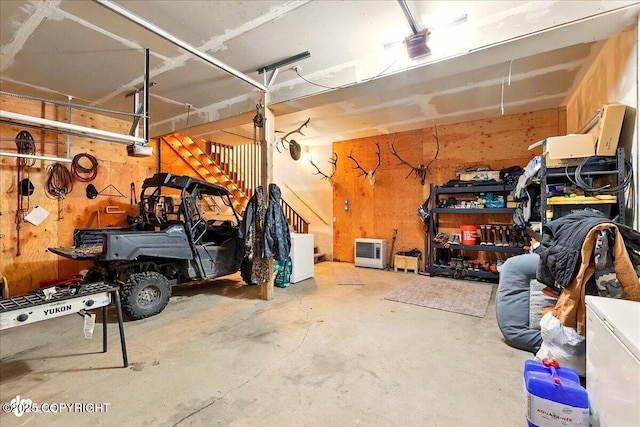 11091 Crestline Ln, Clam Gulch, AK 99568 - garage featuring a garage door opener