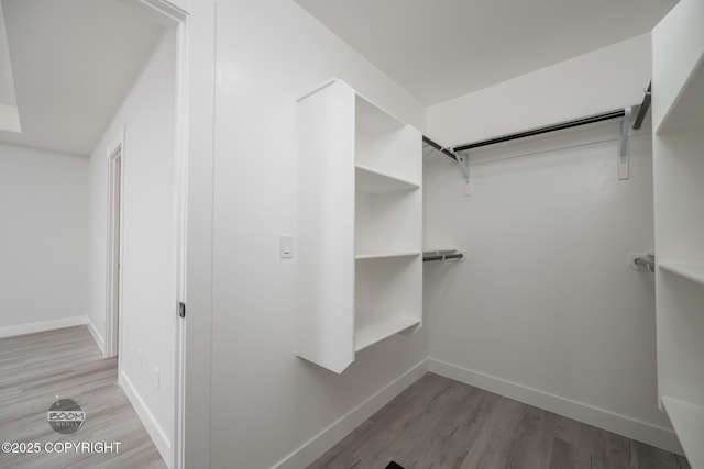 8328 S Ira Dr, Wasilla, AK 99623 - spacious closet with light wood finished floors