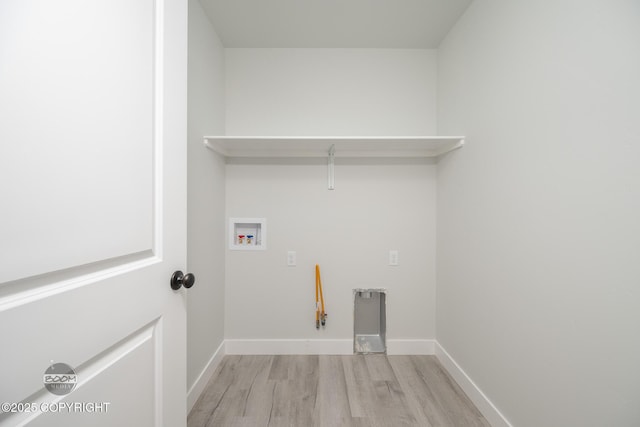 8328 S Ira Dr, Wasilla, AK 99623 - laundry room featuring washer hookup, light wood-type flooring, and hookup for a gas dryer