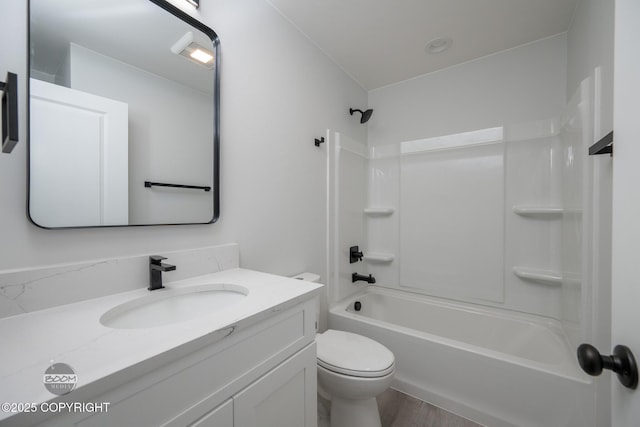 8328 S Ira Dr, Wasilla, AK 99623 - bathroom featuring vanity, washtub / shower combination, and wood finished floors