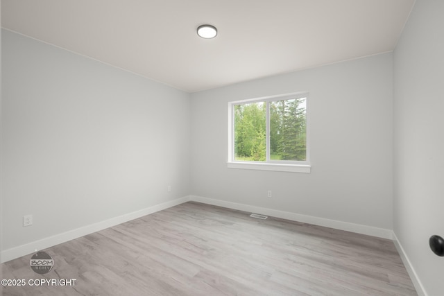 8328 S Ira Dr, Wasilla, AK 99623 - empty room with wood finished floors and baseboards