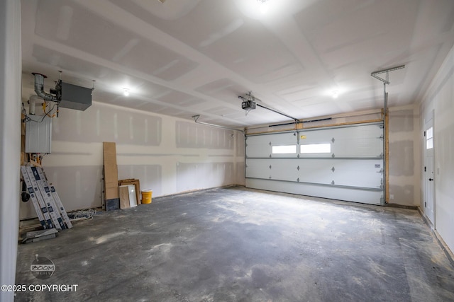 8328 S Ira Dr, Wasilla, AK 99623 - garage featuring a garage door opener