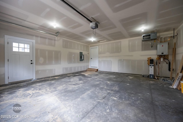 8328 S Ira Dr, Wasilla, AK 99623 - garage with electric panel, a garage door opener, and a heating unit