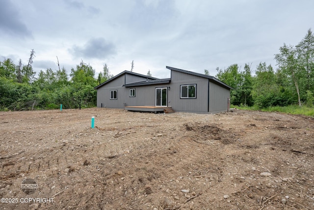 8328 S Ira Dr, Wasilla, AK 99623 - back of property featuring a wooden deck