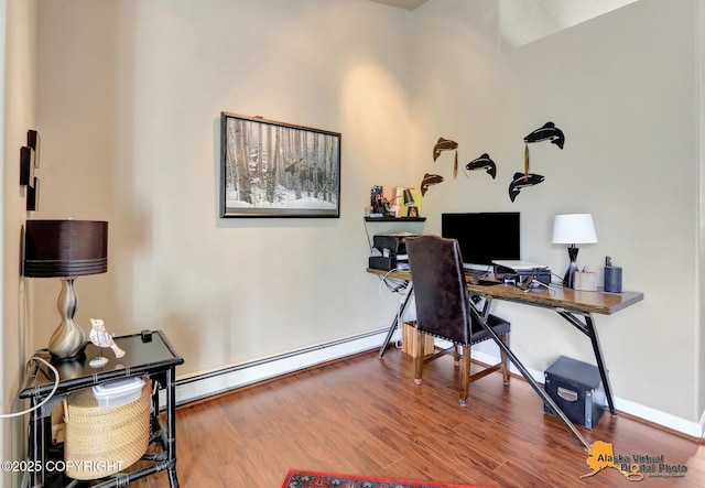 201 E Danna Ave Unit D, Wasilla, AK 99654 - office area featuring baseboard heating, wood finished floors, and baseboards