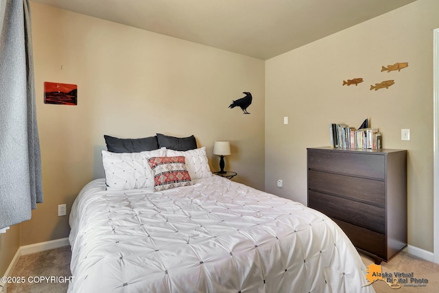 201 E Danna Ave Unit D, Wasilla, AK 99654 - bedroom featuring light colored carpet and baseboards