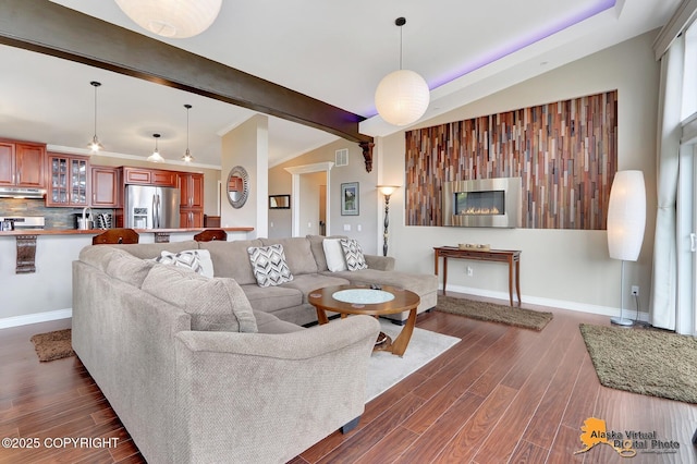 17132 Carl St, Anchorage, AK 99516 - living area featuring dark wood finished floors and baseboards
