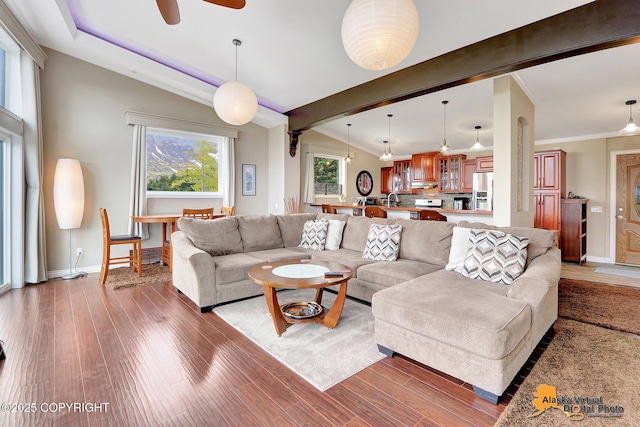 17132 Carl St, Anchorage, AK 99516 - living room with light wood finished floors, a ceiling fan, baseboards, and beamed ceiling