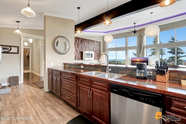 17132 Carl St, Anchorage, AK 99516 - kitchen featuring stainless steel dishwasher, a sink, hanging light fixtures, beam ceiling, and light wood-type flooring