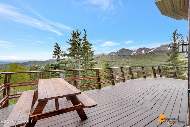 17132 Carl St, Anchorage, AK 99516 - deck featuring a mountain view and outdoor dining space