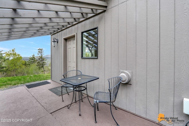 17132 Carl St, Anchorage, AK 99516 - view of patio featuring a pergola