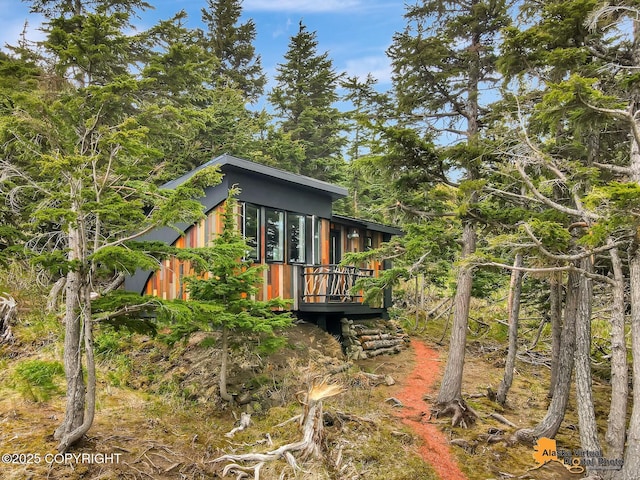 17132 Carl St, Anchorage, AK 99516 - back of property featuring a wooden deck