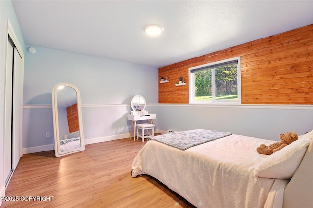 9701 Homestead Trl, Anchorage, AK 99507 - bedroom with wood finished floors and a closet