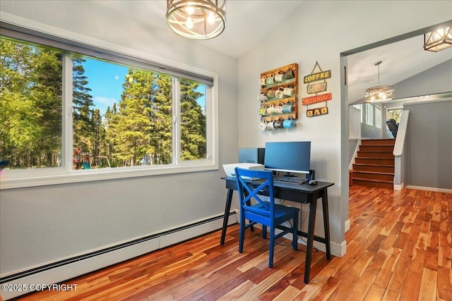 9701 Homestead Trl, Anchorage, AK 99507 - home office with lofted ceiling, a baseboard radiator, hardwood / wood-style flooring, a chandelier, and baseboards
