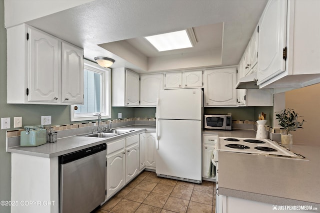 11730 Nix Ct, Anchorage, AK 99515 - kitchen with stainless steel appliances, a sink, white cabinets, and under cabinet range hood