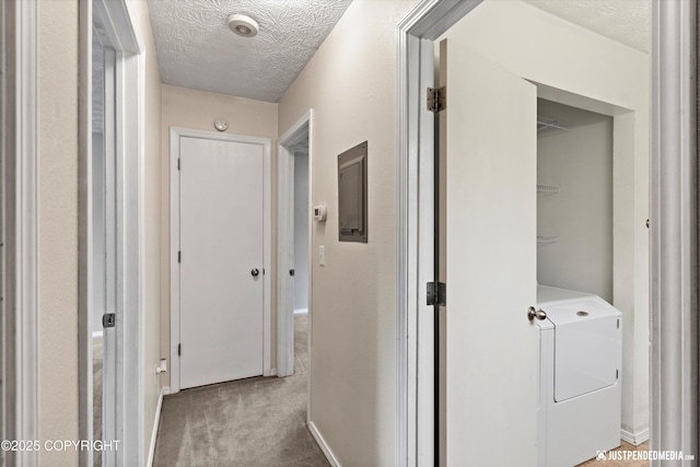 11730 Nix Ct, Anchorage, AK 99515 - corridor with washer / dryer, carpet floors, a textured ceiling, and baseboards