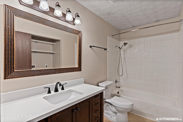 11730 Nix Ct, Anchorage, AK 99515 - full bathroom featuring a textured ceiling, vanity, toilet, and bathtub / shower combination