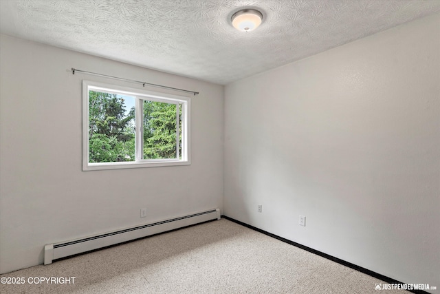 11730 Nix Ct, Anchorage, AK 99515 - empty room with a baseboard radiator, carpet floors, and a textured ceiling